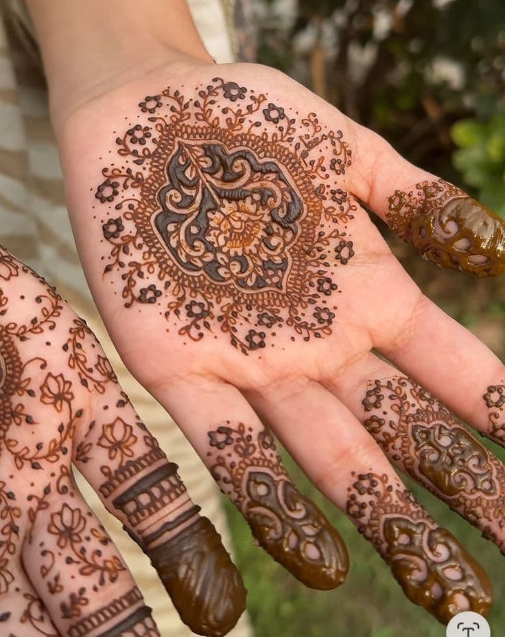 Haldi's Whisper: Intricate Mehndi Mandala on Sun-Kissed Skin